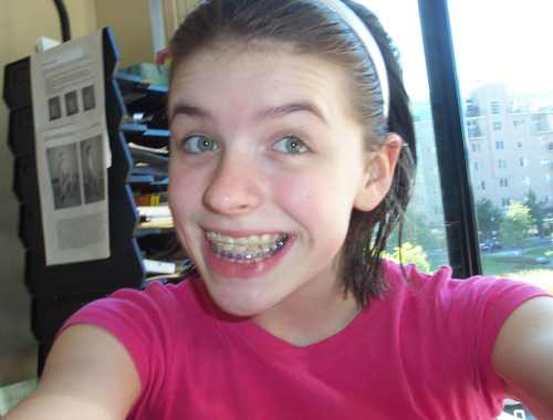 Sofia takes a picture of herself.